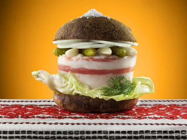 Ukrainian burger with lard — Stock Image Ukrainian burger with lard Stock Photo