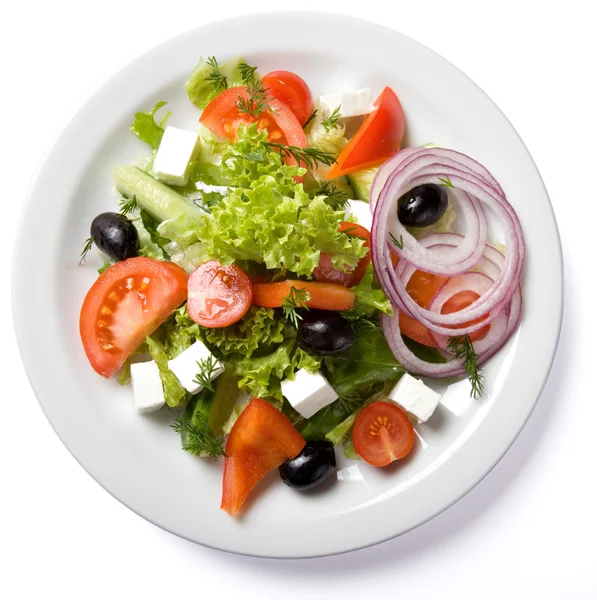 Salade geserveerd op wit bord — Stockfoto