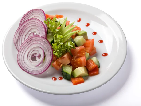 Vegetable salad served on white plate — Stock Photo, Image