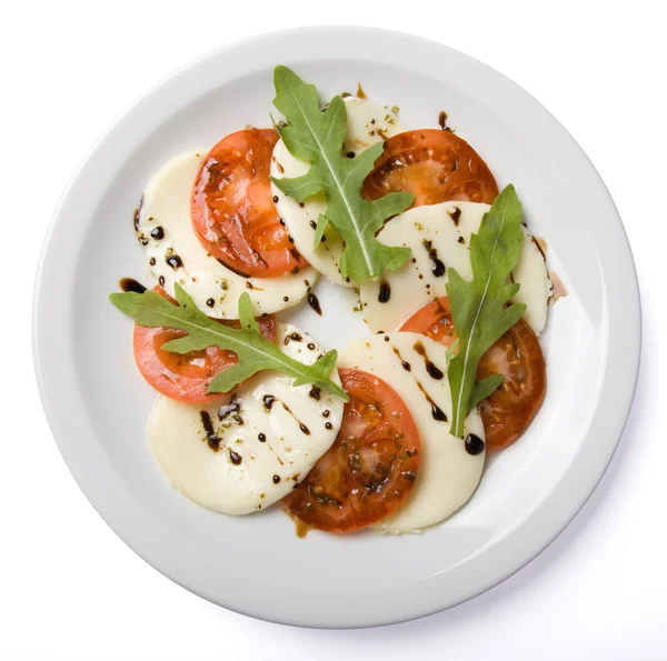 Salat auf weißem Teller. lizenzfreie Stockbilder