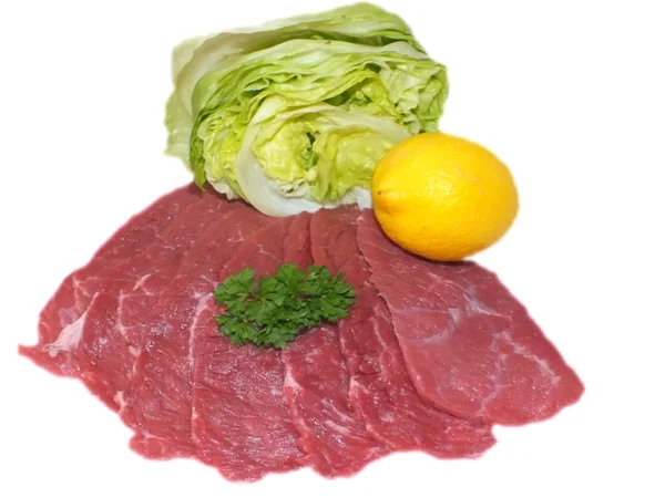 Raw beef tenderloin on a white background — Stock Photo, Image