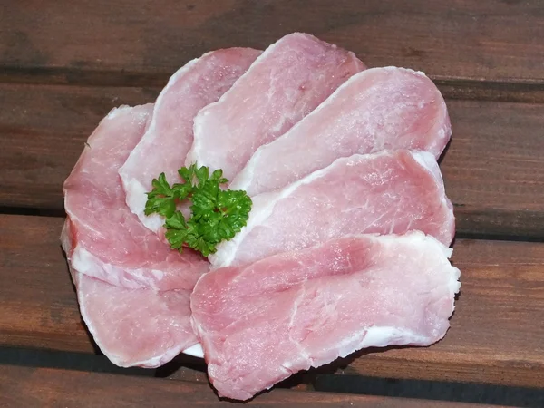 Carne de cerdo magra cruda, cortada en rodajas —  Fotos de Stock
