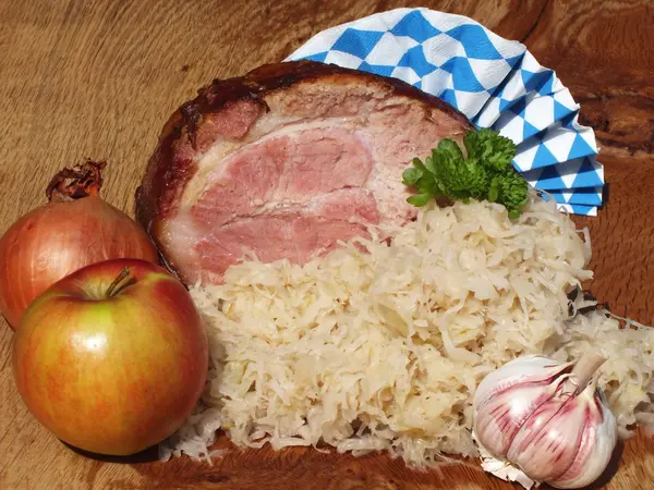 Steamed sauerkraut with smoked pork, kassler und sauerkraut — Stock Photo, Image