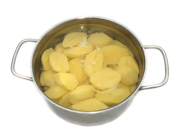 Bio young boiled potatoes with parsley on a oak board — Stock Photo, Image