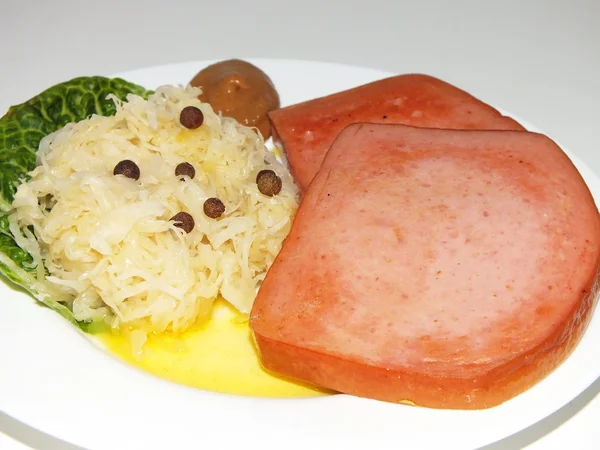 Bavarian meat loaf, leberkaes, with Sauerkraut — Stock Photo, Image