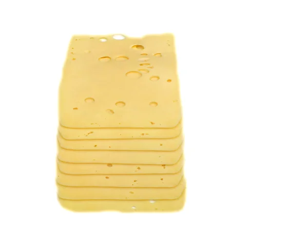 Gesneden kaas op een bord van eiken — Stockfoto