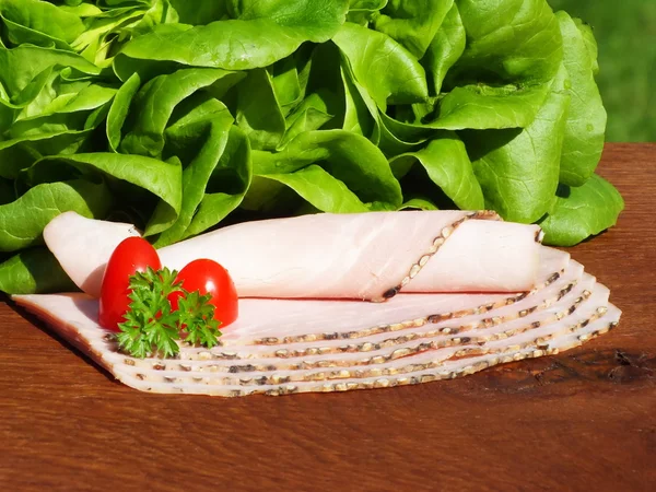 Sausages on the kitchen table — Stock Photo, Image