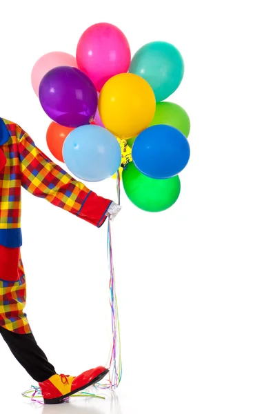 Un payaso sosteniendo globos —  Fotos de Stock