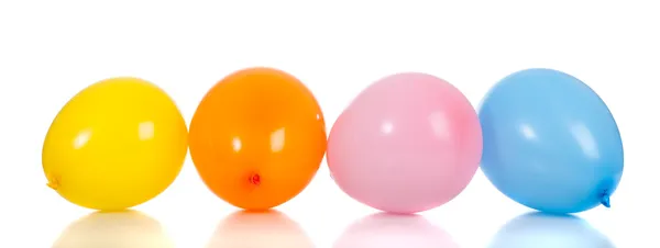 Rad med färgglada ballonger — Stockfoto