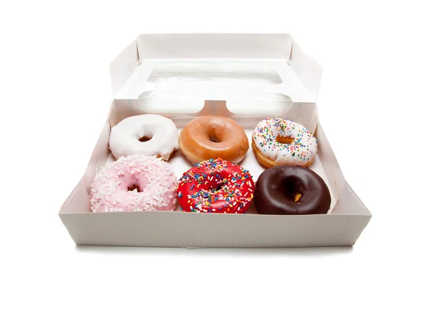 Donuts surtidos en blanco — Foto de Stock