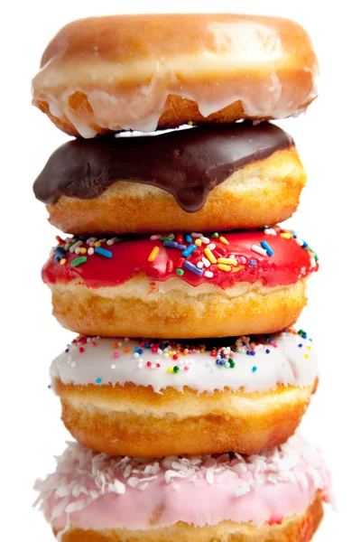 Donuts assortis sur blanc — Photo