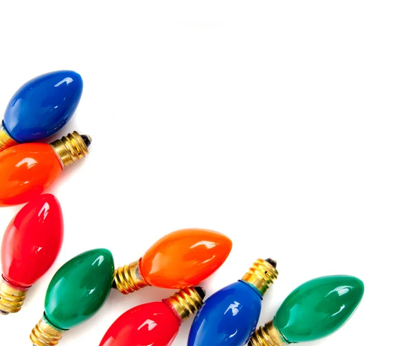 Christmas light bulbs on white — Stock Photo, Image