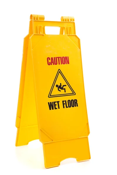 Yellow wet floor sign — Stock Photo, Image