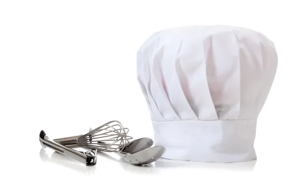 Шапка кухаря та посуд — стокове фото