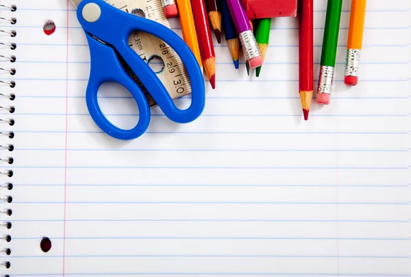 Assorted school supplies with notebooks — Stock Photo, Image