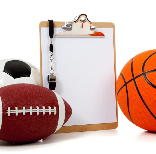 Assorted sports balls with a Clipboard — Stock Photo, Image