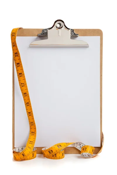 Portapapeles en blanco con cinta métrica — Foto de Stock
