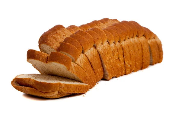 Pão de trigo em fatias — Fotografia de Stock