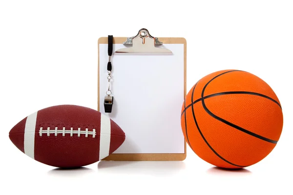 Баскетбол и американский футбол — стоковое фото