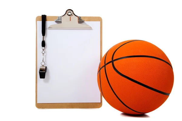 Basketball and clipboard on white — Stock Photo, Image