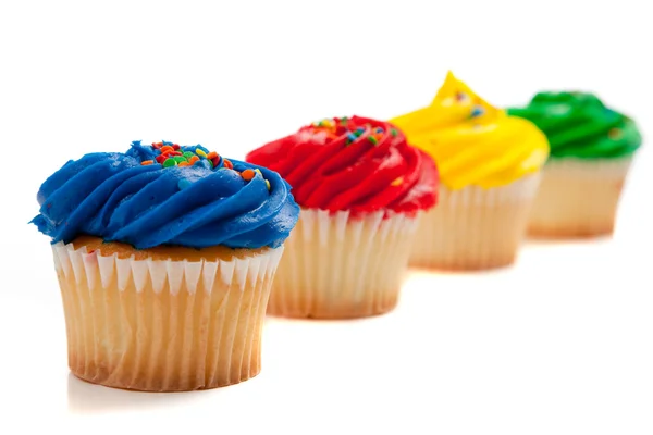 Pastelitos de colores arco iris — Foto de Stock