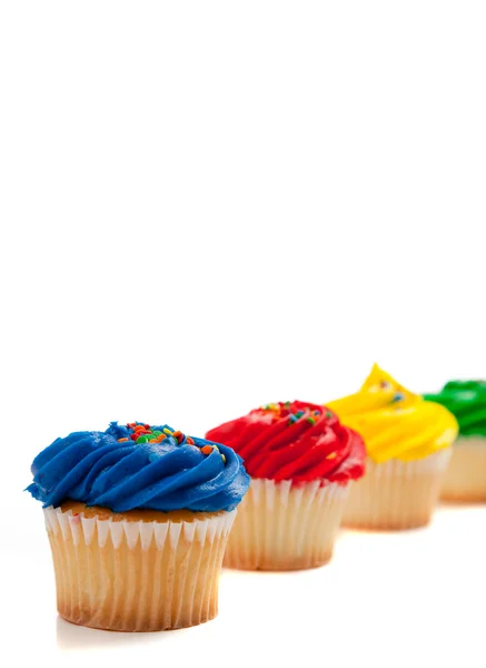 Cupcake assortiti su sfondo bianco — Foto Stock