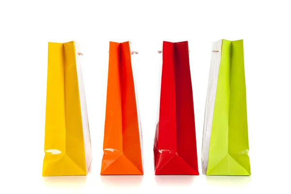 Více barevné tašky na bílém pozadí — Stock fotografie