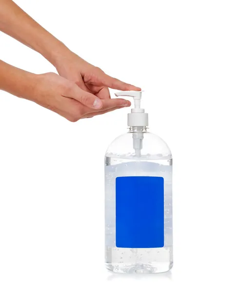 Child's hand dispensing hand sanitizer - flu prevention — Stock Photo, Image