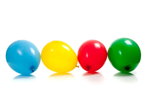 Разноцветные шарики на белом — стоковое фото