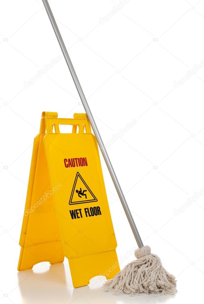 Wet floor sign and mop on white background