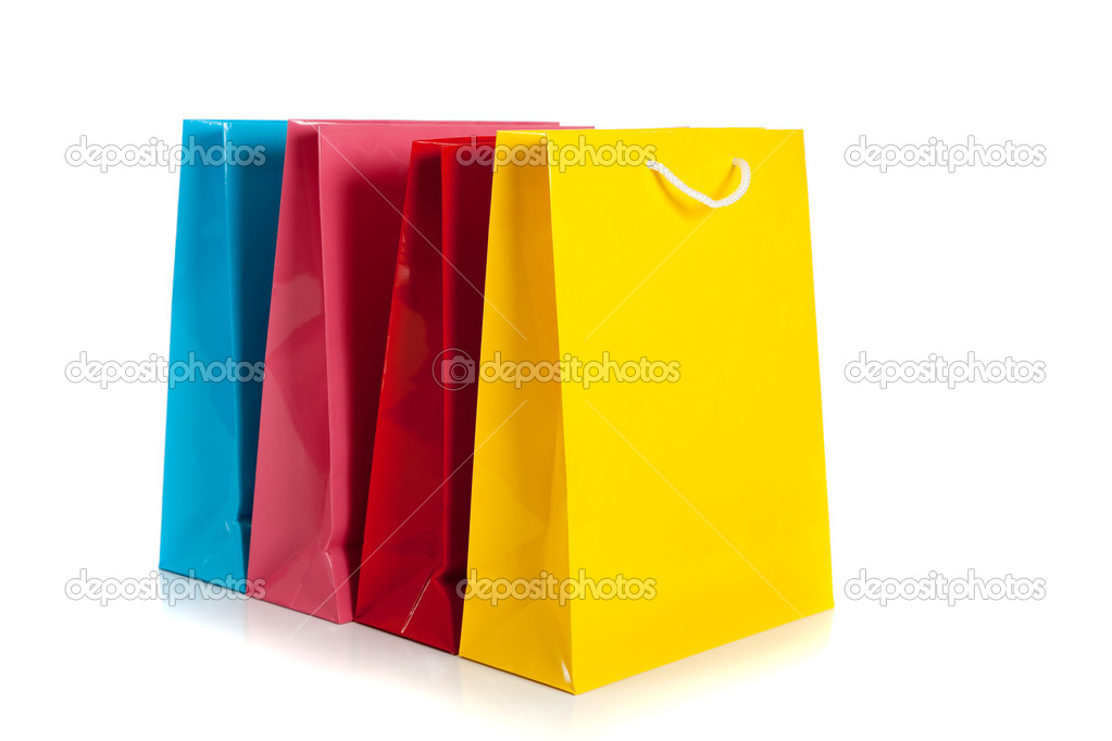 multi colored shopping bags on a white background