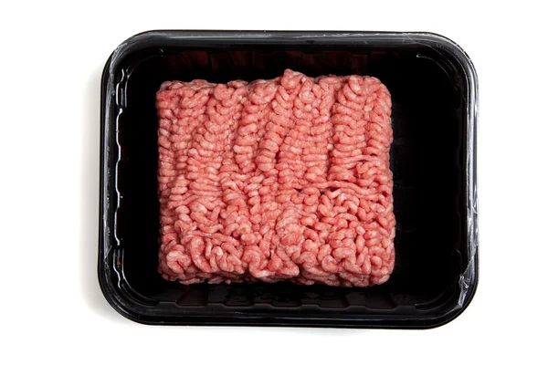 Carne de hambúrguer moída sobre um fundo branco — Fotografia de Stock
