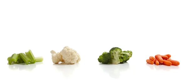 Legumes variados em um fundo branco — Fotografia de Stock