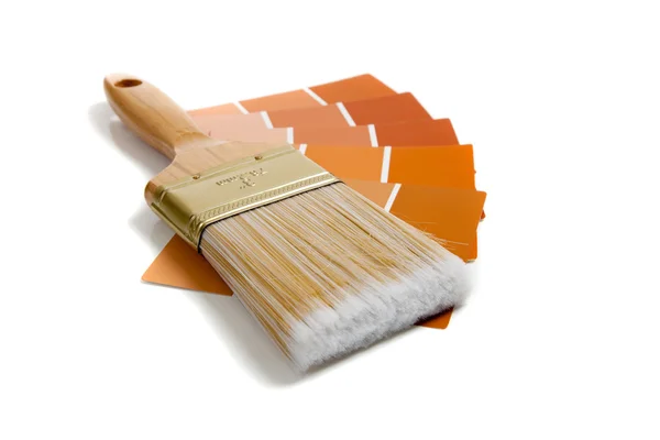 Paintbrush with paint samples — Stock Photo, Image