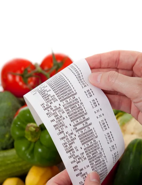 Grocery List over a bag a vegetables — Stock Photo, Image