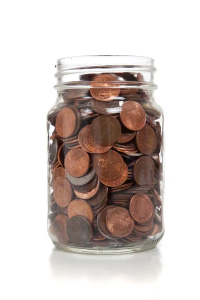 Glass jar full of coins — Stock Photo, Image