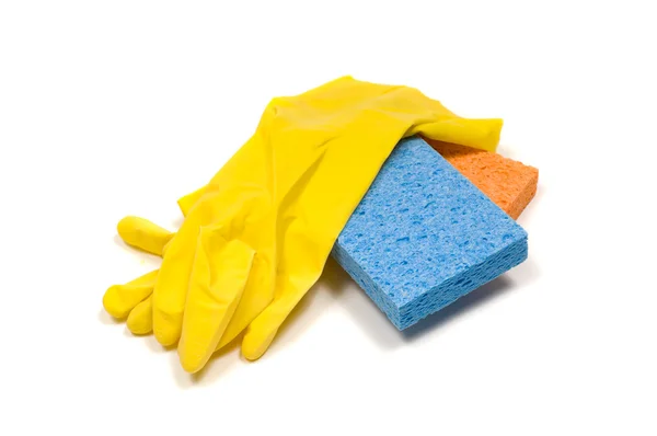 Yellow rubber gloves and sponges — Stock Photo, Image