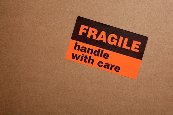 Caixas móveis com adesivos frágeis — Fotografia de Stock
