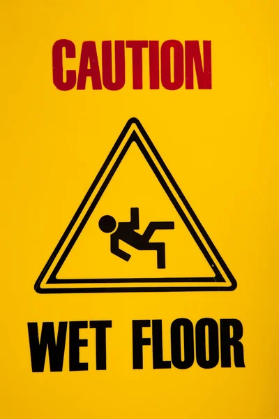 Caution - wet floor sign — Stock Vector © nebojsa78 #2338727