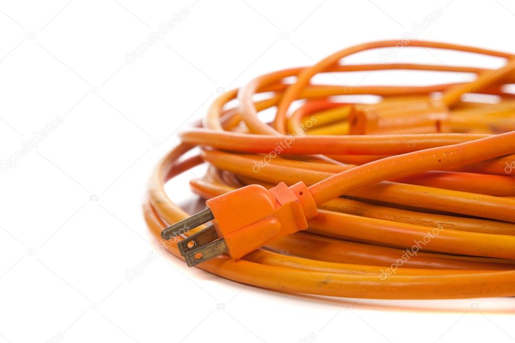 An orange extension cord on white