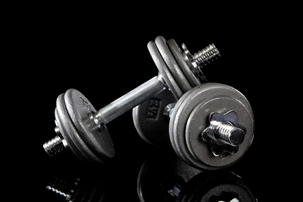 Set of dumbells on black — Stock Photo, Image