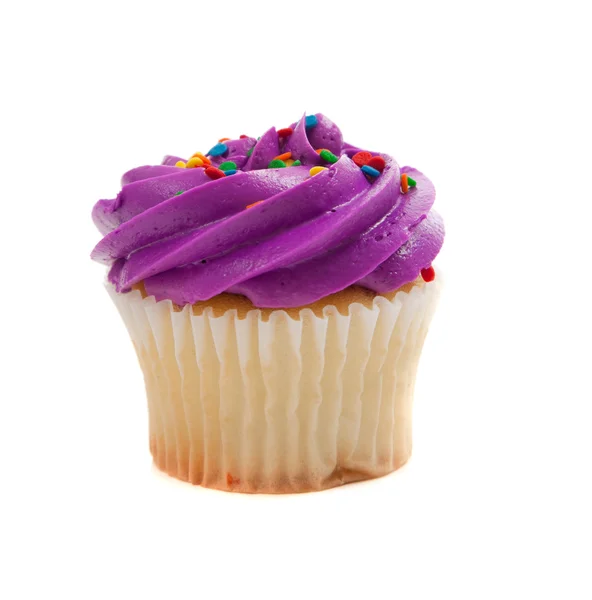Cupcake púrpura con aspersiones en blanco — Foto de Stock