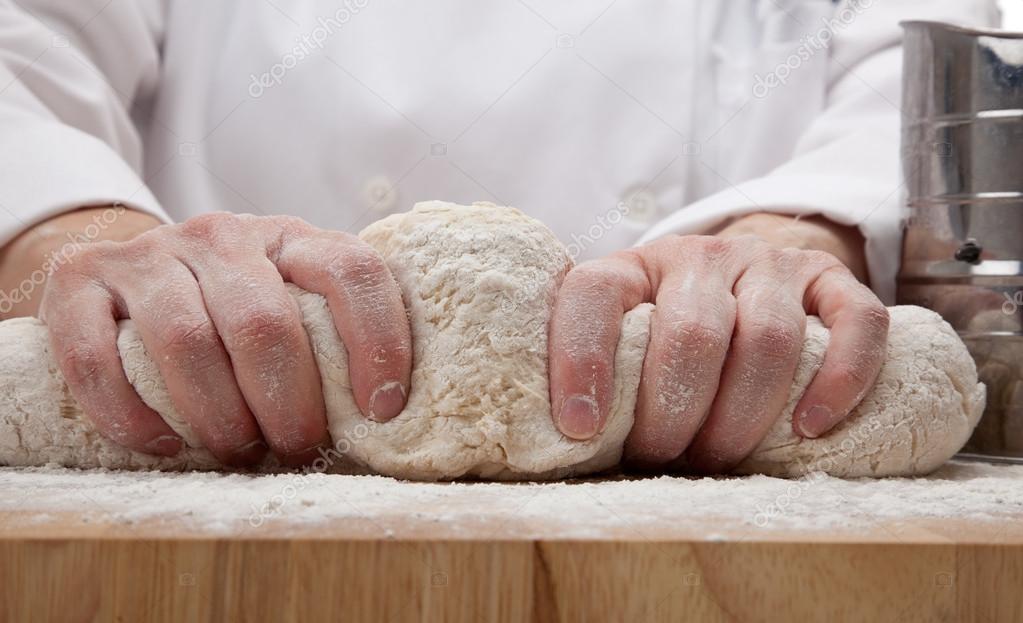 Hands kneading bread dough — Stock Photo © miflippo 13421663