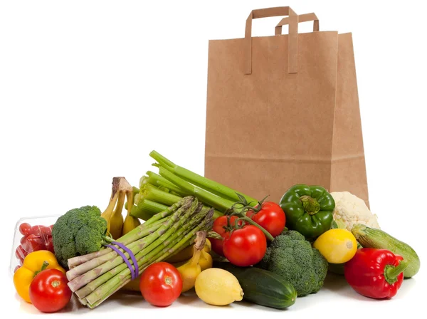 Assorted vegetables with a grocery sack — Stock Photo, Image