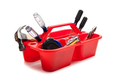 kırmızı bir tepsi içinde çeşitli araçlar