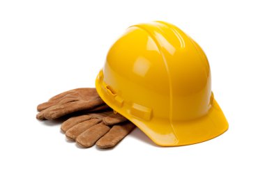 A yellow hard hat and leather work gloves on white