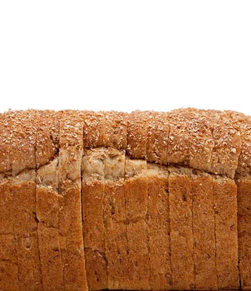 A loaf of whole grain bread on white — Stock Photo, Image