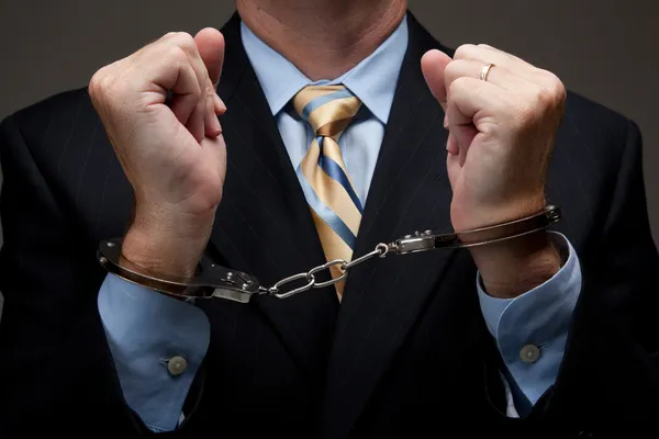 Business man in handcuffs — Stock Photo, Image