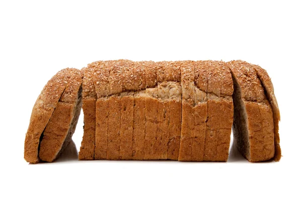 A loaf of whole grain bread on white — Stock Photo, Image