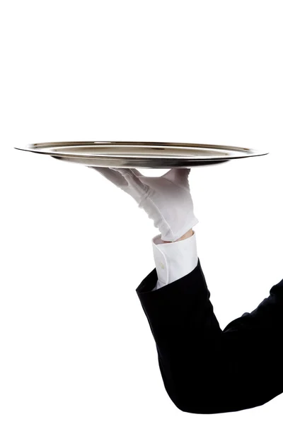 A butler's gloved hand holding a silver tray — Stock Photo, Image